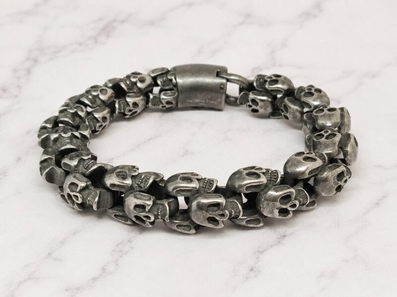 The Skulls Mei's Muse The Skulls | armband | Stainless Steel Mei’s Muse The Skulls armband van roestvrij staal in grijs