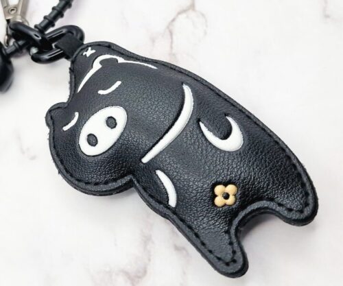 Mei’s Hide Hangout Piggy sleutelhanger van leer in grijs, wit en zwart