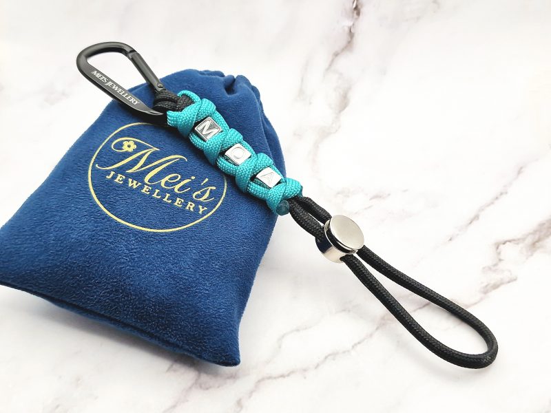 MOA Cord 1 Mei's Keyed sleutelhanger | MOA Cord | Paracord - Aluminium | zwart - turquoise- zilver Mei's Keyed sleutelhanger | MOA Cord | Paracord - Aluminium | zwart - turquoise- zilver