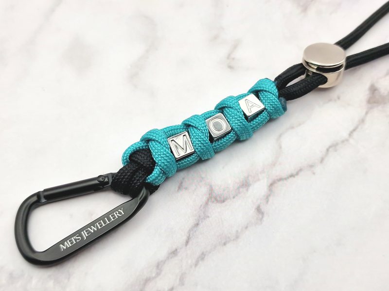 MOA Cord 3 Mei's Keyed sleutelhanger | MOA Cord | Paracord - Aluminium | zwart - turquoise- zilver Mei's Keyed sleutelhanger | MOA Cord | Paracord - Aluminium | zwart - turquoise- zilver - Afbeelding 3