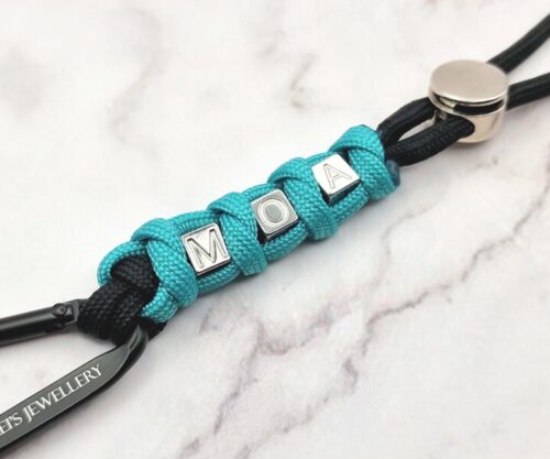 Mei’s Handmade MOA Cord sleutelhanger van roestvrij staal in turquoise, zilver en zwart
