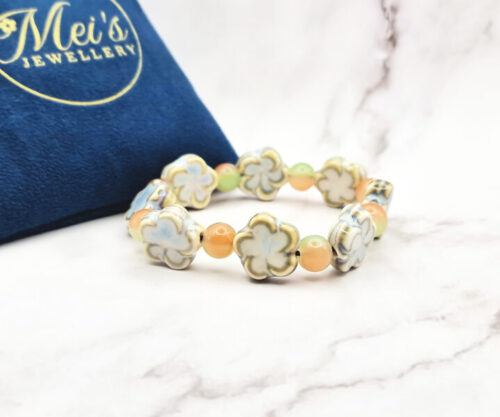 Aqua Blossom 5 Mei's Tibetan Aqua Blossom | armband | Keramiek Mei's Tibetan Aqua Blossom keramische armband met bloemkraal