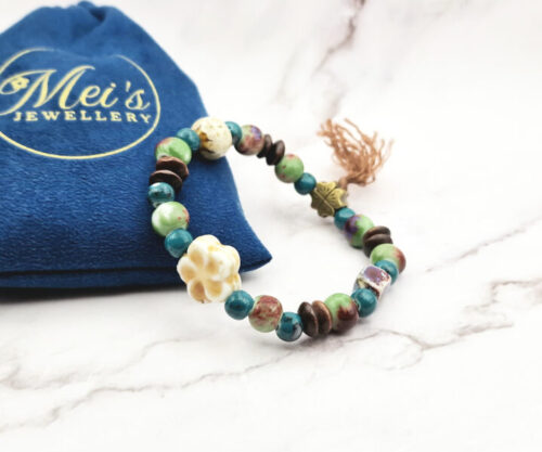 Blooming Clover 5 Mei's Tibetan Blooming Clover | armband | Keramiek Mei's Tibetan Blooming Clover keramische armband met klaver en bloem