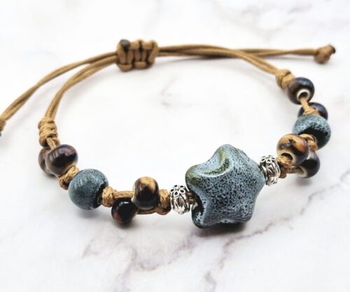 Stone Blossom 2 Mei's Tibetan Stone Blossom | armband | Keramiek Mei's Tibetan Stone Blossom keramische armband met verstelbaar koord