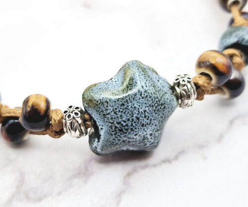 Stone Blossom 3 Mei's Tibetan Stone Blossom | armband | Keramiek Mei's Tibetan Stone Blossom keramische armband met verstelbaar koord