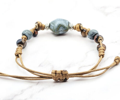 Stone Blossom 5 Mei's Tibetan Stone Blossom | armband | Keramiek Mei's Tibetan Stone Blossom keramische armband met verstelbaar koord